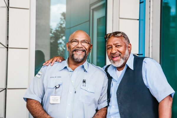 Two IndyGo employees pose together for a photo.
